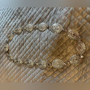Western style silver conch belt.